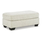 Poggiapiedi Pouf Ottomano Rivestito in Tessuto Beige con Parte Superiore Trapuntata per Soggiorno