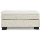 Poggiapiedi Pouf Ottomano Rivestito in Tessuto Beige con Parte Superiore Trapuntata per Soggiorno