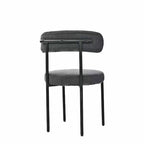 Set di 2 sedie da pranzo moderne rotonde imbottite in Boucle, schienale curvo e gambe in metallo nero verniciato a spruzzo