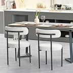 Set di 2 sedie da pranzo moderne rotonde imbottite in Boucle, schienale curvo e gambe in metallo nero verniciato a spruzzo