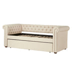 Divano letto Chesterfield in velluto trapuntato con braccioli a voluta, dettagli a bottone e gambe in legno massello